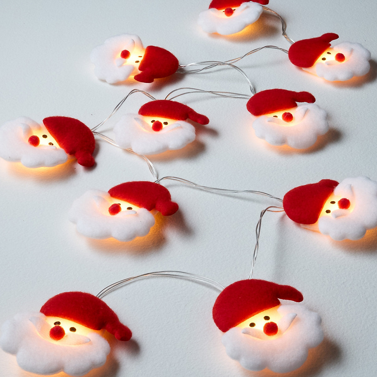 10 Warm white Santa head LED String lights With timer function Clear cable
