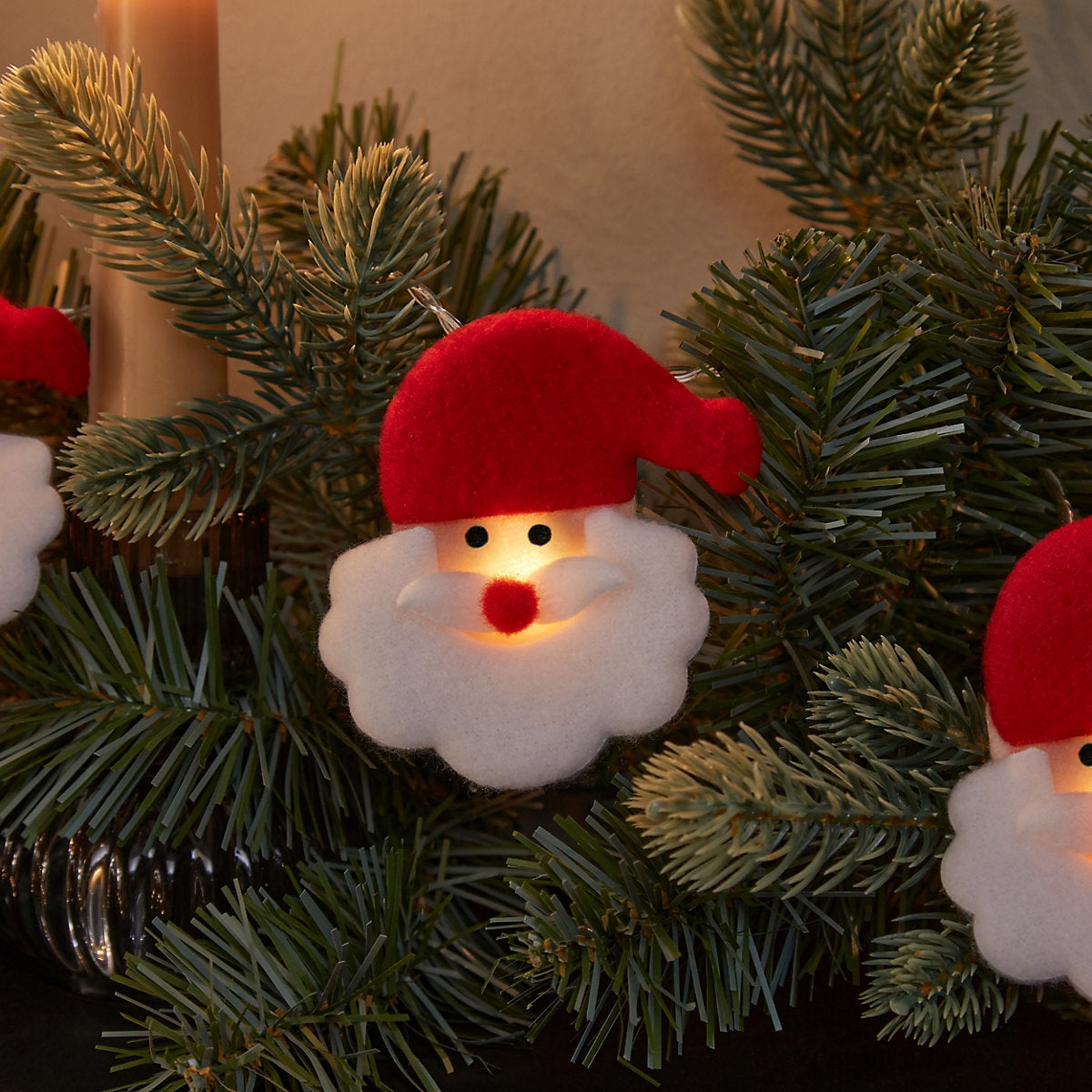 10 Warm white Santa head LED String lights With timer function Clear cable