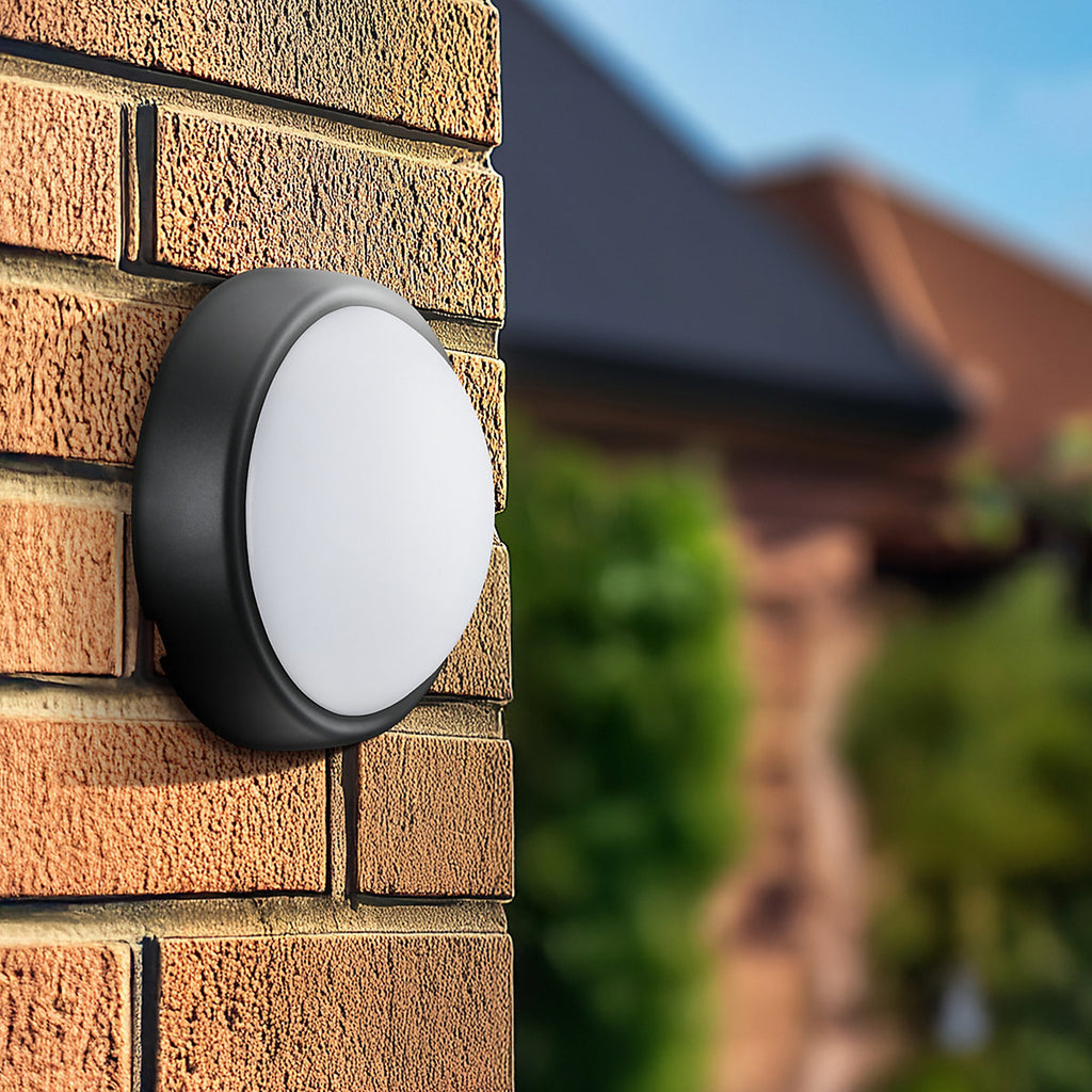 Luceco Fixed Black & White Mains-powered Outdoor Bulkhead wall light 450lm (Dia)16cm